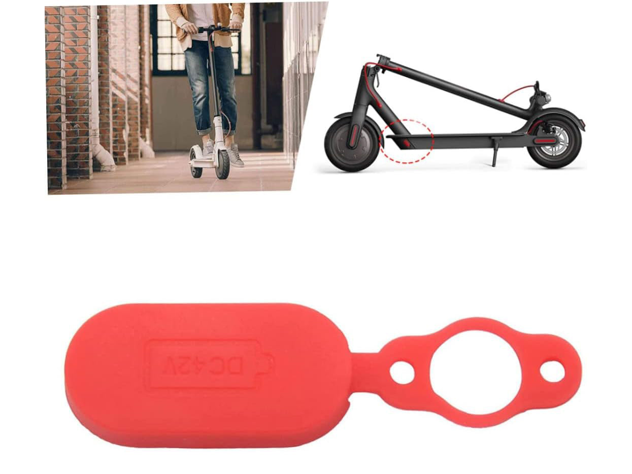 Rote Ladeanschlussabdeckung aus Silikon für den E-Scooter Xiaomi M365, Staub- und Wasserschutz, mit dem Text „DC 42V“.